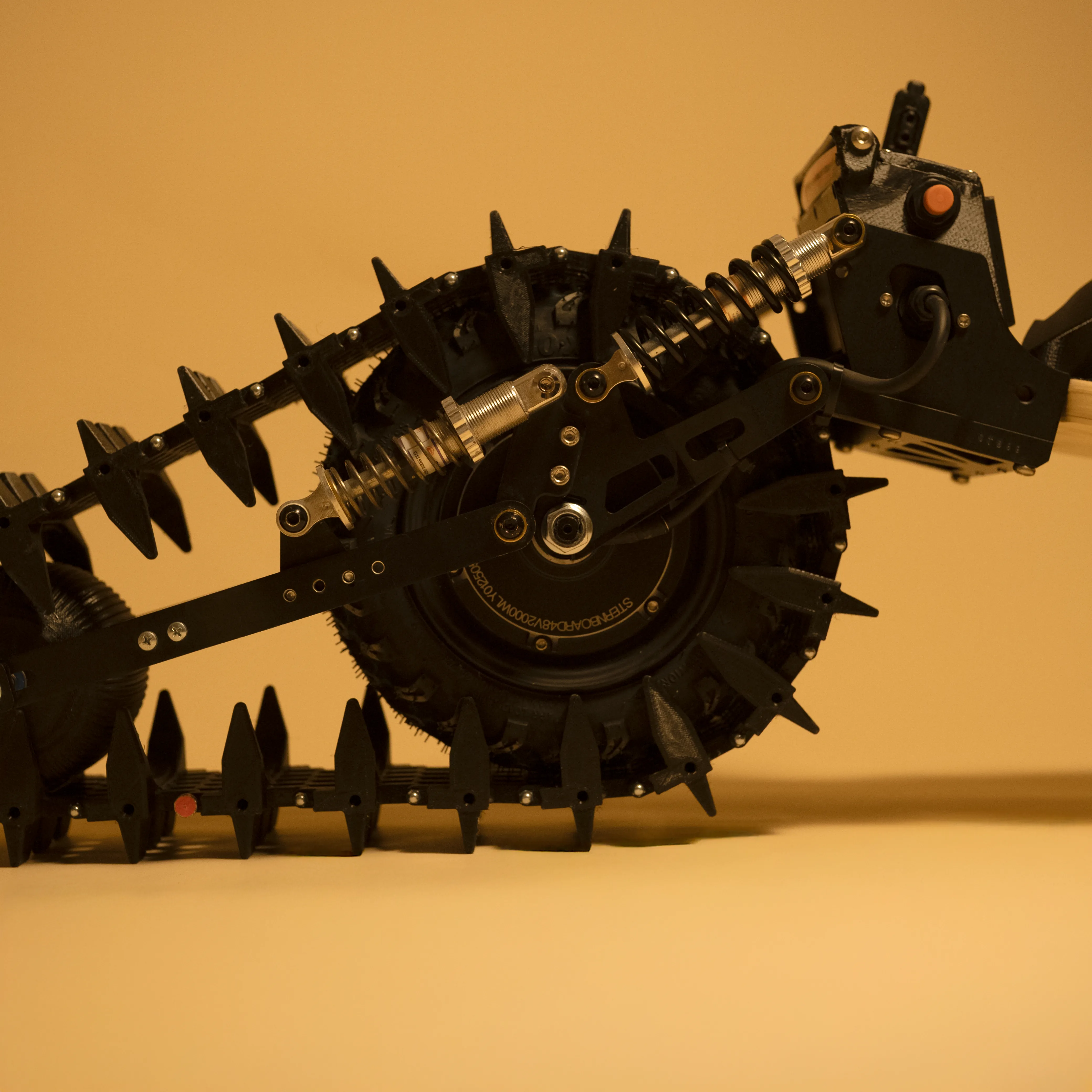 mécanisme roue dentée sable neige skateboard électrique Sternboard transmission chenilles longboard