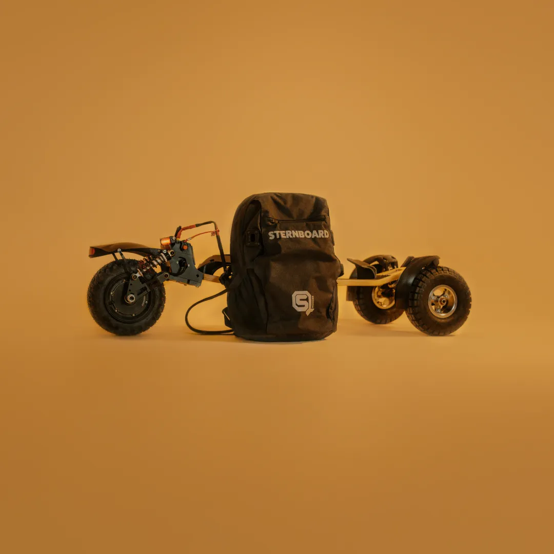 Sac à dos batterie Sternboard avec châssis skateboard électrique trois roues déployé tout-terrain